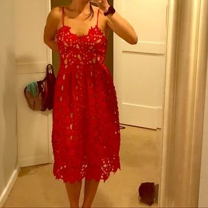 Red lace overlay dress